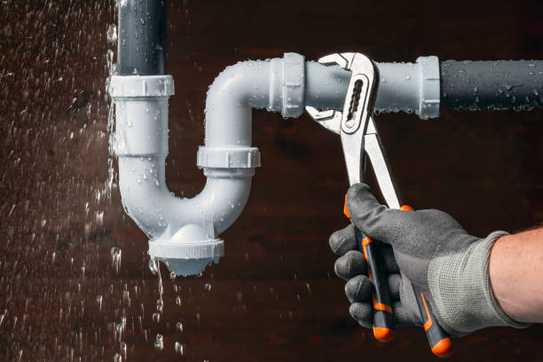 Professional Water Heater Replacement technician working in Moosup, CT